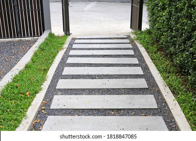 Cement stairs way in the garden to entrance door. - Powered by Shutterstock