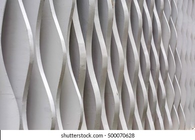 Cement wall plate shape, rounded white.