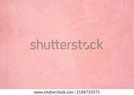 cement wall texture. pink background texture. wall paper shape and have copy space for text. Old textured concrete wall with natural defects. Can be used as background for design or poster.