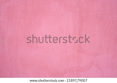 cement wall texture. pink background texture. wall paper shape and have copy space for text. Abstract colorful wall texture and background. Old textured concrete wall with natural defects. 