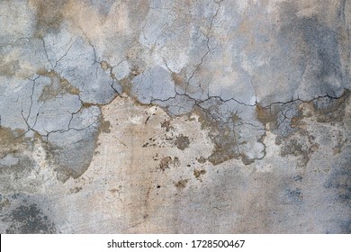 Cement-adhesive texture of the wall. Plaster work with divorces.