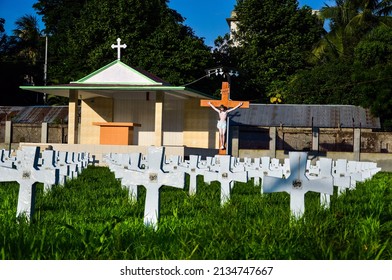 A Cemetery Or Gravesite For The Dead People To Be Buried. Holy Graveyard Of Christian People, Crosses Of The Burial Ground Place For Holy Mass And Christ On The Cross As Sign Of Eternal Peace.