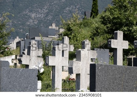 Cemetery with tomb and crosses from marble