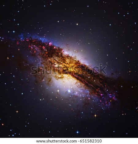 Centaurus A or NGC 5128 is a prominent galaxy in the constellation of Centaurus. The center of the galaxy contains a supermassive black hole. Elements of this image furnished by NASA.