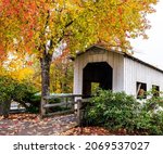 Centennial Covered Bridge in Downtown Cottage Grove Oregon With Autumn Foliage