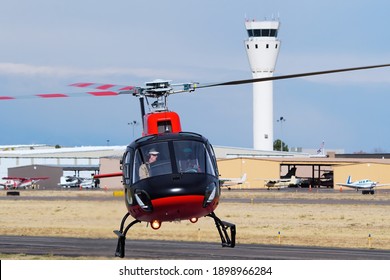 CENTENNIAL, USA-OCT 17: Saberair Helicopter Lands On October 17, 2020 At Centennial Airport Near Denver, Colorado. This Airport Is One Of The Busiest General Aviation Airports In USA