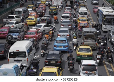 CENTER, BANGKOK, THAILAND - SEPTEMBER 2016: Busy traffic jam with cars and buses, in Ratchadamri Road in central Bangkok.