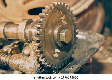 Center Frame Camshaft Sprocket And Overhead Camshaft And Rocker Arm Of Car Engine In Vintage Tone