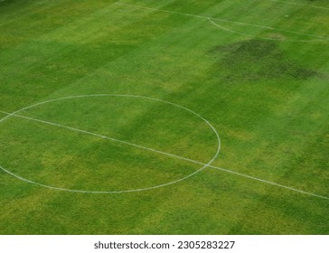 center of a grass soccer field aerial view. sport concept - Powered by Shutterstock