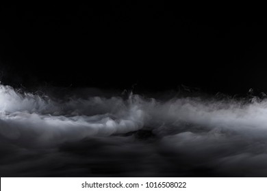 Center low fog rolling with billows - Shutterstock ID 1016508022