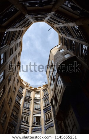 Similar – Schmales Fenster in der Steinmauer mit Blick auf das Pariser Stadtbild