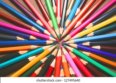 Center Symbol Of Vector Business Team One Goal, One Aspiration And Desire  Bunch Of Colored Pencils Isolated On White Background