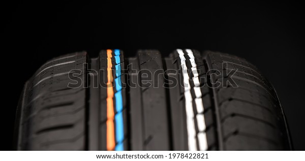 Centered car tyre profile close\
up