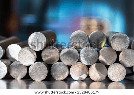 Centered view, stack of steel rods in a factory, a product of the metallurgical industry