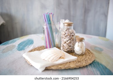 Centerpiece Of A Rustic House On The Beach. With Seashells