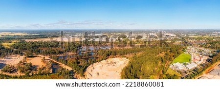 Central aerial panorama of Nepean river under Blue Mountains around Greater Sydney basin in Australia.