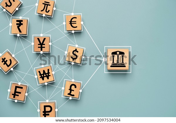 Central banking icon connect\
linkage with currency sign include US dollar Euro Yen Yuan and\
pound sterling for global money exchange and transfer or forex\
concept.