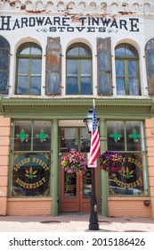 Central City, Colorado, USA - July 22, 2021.  A Medical And Recreational Marijuana Dispensary In Colorado.  Glass Storefront, Ornate Windows On A Vintage Downtown Building.