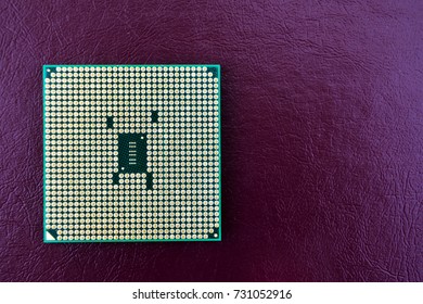 Central computer processor on dark backgrounds from places under the inscription