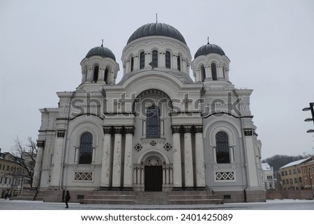 Central entrance of the church of the archangel Michael in foggy winter Kaunas