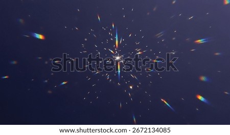 A central explosive burst of light with tiny particles radiating outward in every direction, giving a cosmic or explosive impression.
