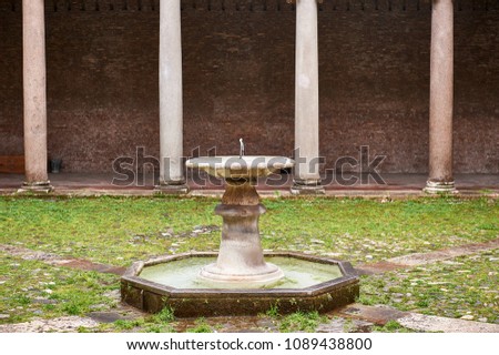 central fountain in the cloister of a church