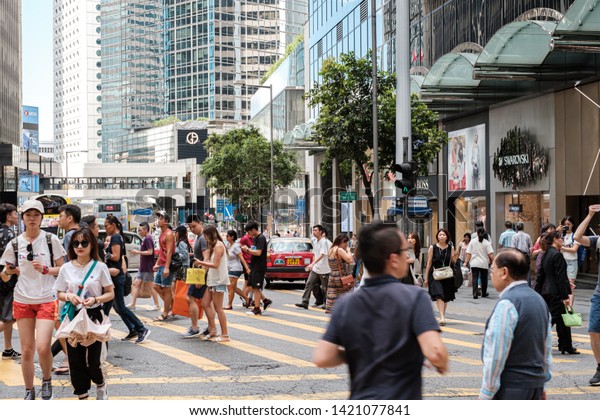 Central, Hong Kong - June 07 2019 : Public\
transport in Central district. Central is the central business\
district of Hong Kong.
