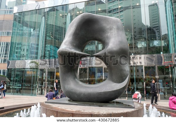 CENTRAL , HONG KONG , MARCH 24 : Art statue in\
front of Hong Kong Station and IFC mall at Central district , Hong\
Kong on March 24 2016.