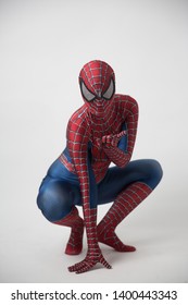 Central, Hong Kong - May 19, 2019: Man In Superhero Costume Comic Marvel Spider On Gray Background