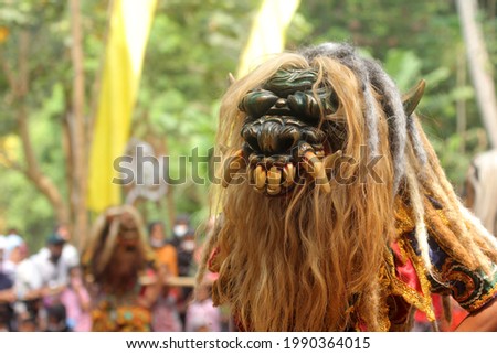 Central Java, Indonesia - June 14, 2021: , Rampak Buto Mask dance, a new traditional dance creation, in the area Central Java, Indonesia.