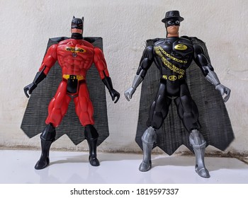 Central Java, Indonesia - September 21, 2020: Superhero toys: Zorro mask and Batman collected by a small child to accompany the covid-19 pandemic quarantine period.