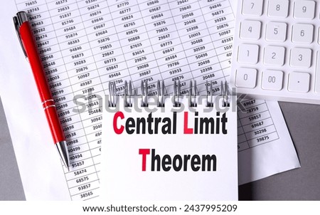CENTRAL LIMIT THEOREM text on a notebook with chart , pen and calculator. 