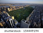 Central Park aerial view, Manhattan, New York; Park is surrounded by skyscraper