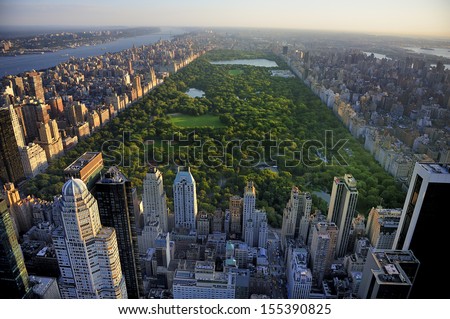 Central Park aerial view, Manhattan, New York; Park is surrounded by skyscraper 