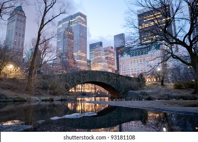 Central Park Bridge At Dawn In New York.