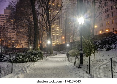 Central Park, New York City At Night During Snow Storm