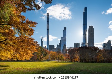 Central Park Sheep Meadow Lawn In Fall With Billionaires Row Skyscrapers. Midtown Manhattan, New York City