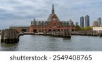 Central Railroad of New Jersey Terminal (CRRNJ) is now Statue of Liberty ferry departure point on the Hudson River in Liberty State Park, Jersey City, New Jersey.