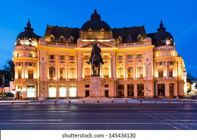 The Central University Library is located in central Bucharest with statue of Carol I, first king of Romania in front. Romania