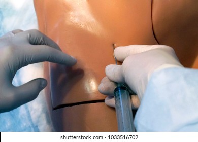 Central Venous Access Via Femoral Vein Puncture Procedure Technique On A Simulation Medical Training Model. Femoral Artery Puncture. Medical Procedure Concept, Simulation Medicine Training.