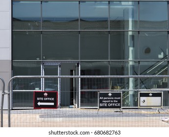 Central Way, Feltham, Middlesex, England - July 17, 2017: Site Office Sign Mounted On Security Fencing, New Commercial Warehouse And Office Development