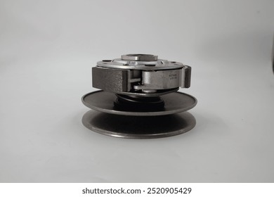 centrifugal clutch set of motorcycle or scooter.Motorcycle automatic clutch uses centrifugal force with the driving shaft nested inside the driven shaft. - Powered by Shutterstock