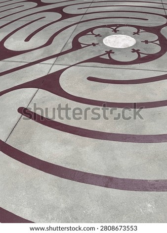 A centuries-old labrinth pattern decorates this outdoor courtyard in uptown Charlotte. NC 2026
