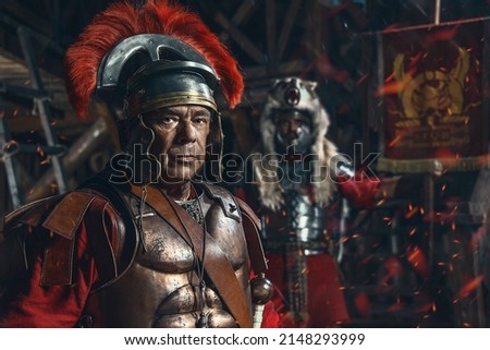 Centurion and vexillary in the service of the Roman Empire. Night