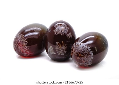 Century eggs or preserved eggs isolated on white background