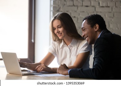 Ceo Advisor Consulting African Client Looking At Computer Screen Analyse Data, Diverse Colleagues Discuss Online Project Use Pc, Mentor Teach Help Black Intern, Teamwork Assistance Partnership Concept