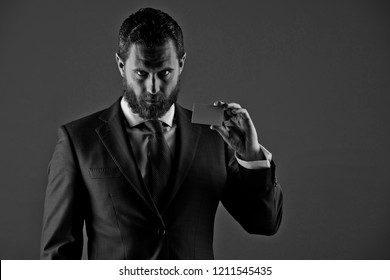 Ceo Or Man With Business Or Credit Card In Blue Formal Outfit In Shadow On Grey Background, Copy Space, Business Ethics, Shady Business