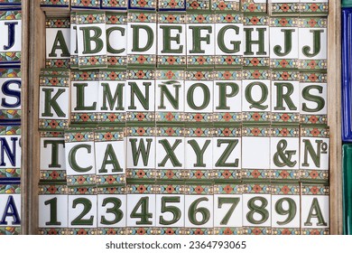 Ceramic alphabet tiles, a beautiful fusion of art and language - Shutterstock ID 2364793065