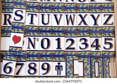Ceramic alphabet tiles, a beautiful fusion of art and language - Shutterstock ID 2364793071