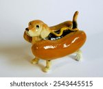 ceramic artwork bizarre figurine  depicting  a hot dog                      